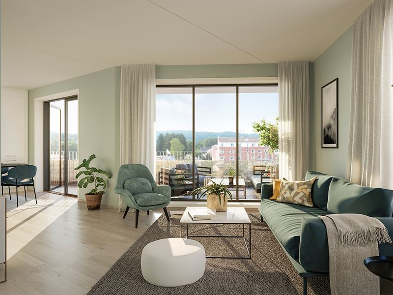 Bilde av en stue med godt dagslys og lyse farger på møbler og interiør. Fra boligprosjektet Skårerløkka på Lørenskog. Foto til artikkel om fordeler med å kjøpe leilighet i nybygg.