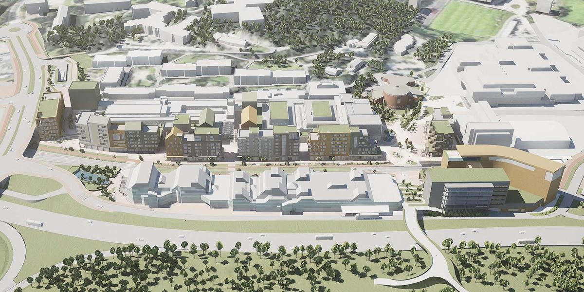 3D-illustrasjon med hvite og grønne bygningsmodeller, av det nye bysentrumet som Thon Eiendom planlegger i Åsane.